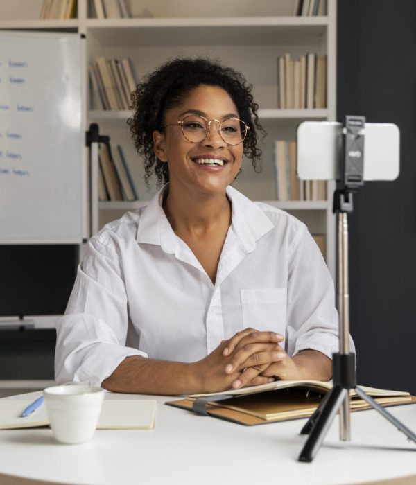 medium-shot-smiley-woman-recording-herself